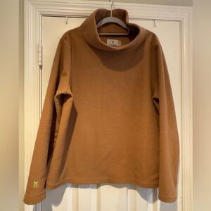 Dudley Stephen’s camel colored vello fleece turtleneck